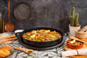 El arte de cocinar en una sartén grande: recetas y técnicas para dominar la paellera